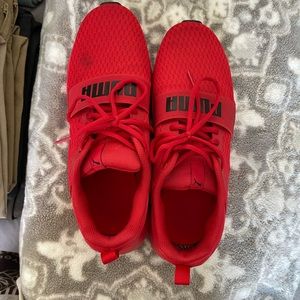 Puma gym shoes 
Red 9 1/2 used a few times 
No box 
$20 each